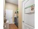 Functional laundry room with modern appliances and storage solutions at 5144 Riverlake Dr, Bartow, FL 33830