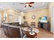 Comfortable living room with wood flooring and a wall mounted television at 5144 Riverlake Dr, Bartow, FL 33830
