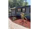 Exterior view of home featuring a porch with lush landscaping at 5580 Hwy 542 W, Winter Haven, FL 33880