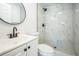 Bathroom featuring a white marble tiled shower at 1475 3Rd Ave, Deland, FL 32724