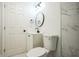 Bathroom with modern fixtures and white vanity with black hardware at 1475 3Rd Ave, Deland, FL 32724