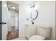 Bathroom with modern fixtures and white vanity with black hardware at 1475 3Rd Ave, Deland, FL 32724