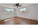 Bedroom with two large windows and a ceiling fan at 1475 3Rd Ave, Deland, FL 32724