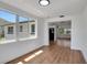 Bright living room features wood flooring and lots of natural light at 1475 3Rd Ave, Deland, FL 32724
