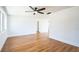 Spacious living room showcasing modern flooring, neutral walls and contemporary ceiling fan at 1475 3Rd Ave, Deland, FL 32724