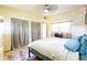Bedroom featuring neutral tones, lots of light, and plentiful closet space at 2908 Maplewood Ave, Lakeland, FL 33803