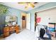 Spacious home office with a vanity desk, closet, and blue accent wall at 2908 Maplewood Ave, Lakeland, FL 33803