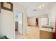 Well-lit kitchen view showing open layout into living space and laundry room at 3365 Bahama Ct, Lake Wales, FL 33898