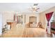 Open-concept living room featuring tile and laminate flooring, natural light, and traditional style at 3365 Bahama Ct, Lake Wales, FL 33898