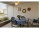 Charming patio area with outdoor seating, decorative accents, and a cozy ambiance at 3533 Roanoke St, The Villages, FL 32162