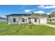 Charming single-story home with a well-maintained lawn and stone accents at 534 S Perry Ave, Fort Meade, FL 33841