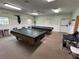 Spacious game room featuring two pool tables and ample seating for entertainment at 65 Joppa Dr, Winter Haven, FL 33884