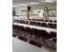 Hall with tables and chairs, ideal for events or community gatherings at 65 Joppa Dr, Winter Haven, FL 33884