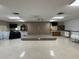 Large, versatile meeting room with a stage, perfect for events and gatherings at 65 Joppa Dr, Winter Haven, FL 33884
