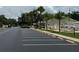 Wide shot of community parking lot and amenities in a well-maintained setting at 65 Joppa Dr, Winter Haven, FL 33884