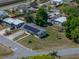 Aerial view of the neighborhood featuring a single-Gathering home with solar panels and a spacious yard at 3928 Cherry Way, Lakeland, FL 33805