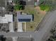 Overhead view of property with solar panels and yard at 3928 Cherry Way, Lakeland, FL 33805