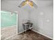 A room with grey walls and a stainless steel sink station, ceiling fan overhead at 3928 Cherry Way, Lakeland, FL 33805