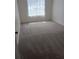 Clean carpeted bedroom featuring a window that lets in natural light at 1219 Santos Pl, Lady Lake, FL 32159