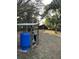 Water purification and water tanks in the back yard at 18700 Ravenswood Rd, Altoona, FL 32702
