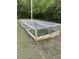 Enclosed raised garden beds offer protection for growing vegetables, fruits, or flowers at 18700 Ravenswood Rd, Altoona, FL 32702