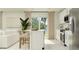 Bright kitchen with stainless steel appliances and a cozy island with seating for casual dining at 4734 Bold Peacock Bnd, Bartow, FL 33830