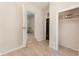 Hallway view featuring access to the rooms, closet and backyard at 933 W Queen St, Lakeland, FL 33803