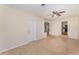 View of open living room featuring beautiful tile floors and natural light at 933 W Queen St, Lakeland, FL 33803