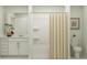 Clean, modern bathroom with a shower, vanity, and neutral color scheme at 971 Hour Glass Rd, Lakeland, FL 33801