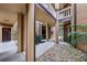 Charming exterior view of the property showcasing the architectural details and landscaped surroundings, creating curb appeal at 490 N Pin Oak Pl # 112, Longwood, FL 32779