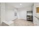 Bright and airy room featuring tiled floors, a small window and an iron bakers rack at 490 N Pin Oak Pl # 112, Longwood, FL 32779