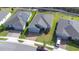 Aerial view of the neighborhood showcases well-maintained homes and community streets at 670 Campo Ln, Davenport, FL 33837