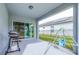 Bright back patio features room for a grill and a play area with a fenced-in yard at 670 Campo Ln, Davenport, FL 33837
