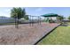 Community playground with swings and a covered play structure at 670 Campo Ln, Davenport, FL 33837