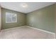 Bedroom with neutral walls, tile floors, and window view at 114 Valencia Loop, Altamonte Springs, FL 32714
