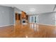 Spacious living room with hardwood floors, built-in shelving and a cozy fireplace at 114 Valencia Loop, Altamonte Springs, FL 32714