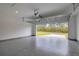 Spacious two-car garage with a sealed floor, automatic door, and view to the outdoors at 16538 Sw 31St Terrace, Ocala, FL 34473