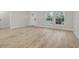 Bright living room featuring natural light, neutral walls and modern flooring at 16538 Sw 31St Terrace, Ocala, FL 34473