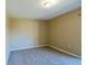 Bedroom featuring neutral paint, carpet floors, and overhead lighting at 2500 21St Nw St # 71, Winter Haven, FL 33881