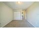 Bedroom showcasing neutral paint, closet with white doors, and carpet flooring at 2500 21St Nw St # 71, Winter Haven, FL 33881