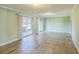 Spacious living area with neutral walls, recessed lighting, and sliding glass doors to outdoor living at 2500 21St Nw St # 71, Winter Haven, FL 33881