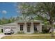 Charming single-Gathering home with classic architecture, well-manicured lawn, and two-car garage at 10292 Kristen Park Dr, Orlando, FL 32832