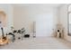 Spacious living room with neutral carpet, a window, and ample space for furniture at 10292 Kristen Park Dr, Orlando, FL 32832