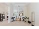 Open-concept living space with musical instruments, bright atmosphere, and views to backyard at 10292 Kristen Park Dr, Orlando, FL 32832