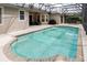 Sparkling screened-in pool and patio area offers a relaxing outdoor space for entertainment at 10292 Kristen Park Dr, Orlando, FL 32832