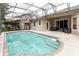 Inviting screened-in pool with patio area, perfect for relaxation and outdoor entertainment at 10292 Kristen Park Dr, Orlando, FL 32832