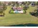 Expansive aerial view of the private estate, featuring a pool, lush landscaping, and exceptional curb appeal at 12329 Sw 140Th Loop, Dunnellon, FL 34432