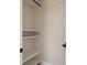Walk-in closet with built-in shelving ready for customization at 12329 Sw 140Th Loop, Dunnellon, FL 34432