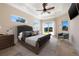 Bedroom features tray ceiling, neutral colors, and access to the backyard at 12329 Sw 140Th Loop, Dunnellon, FL 34432