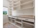 Walk-in pantry with abundant white shelving and storage space at 12329 Sw 140Th Loop, Dunnellon, FL 34432